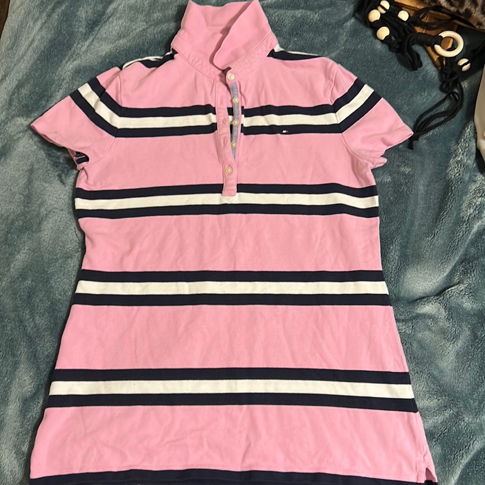 The shirt has been worn multiple times no stains or tears.